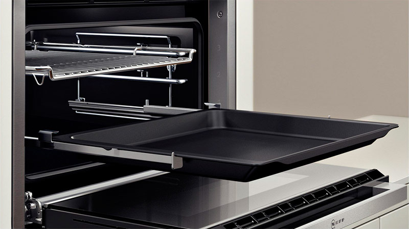 Mécanisme d'extension du plateau de cuisson